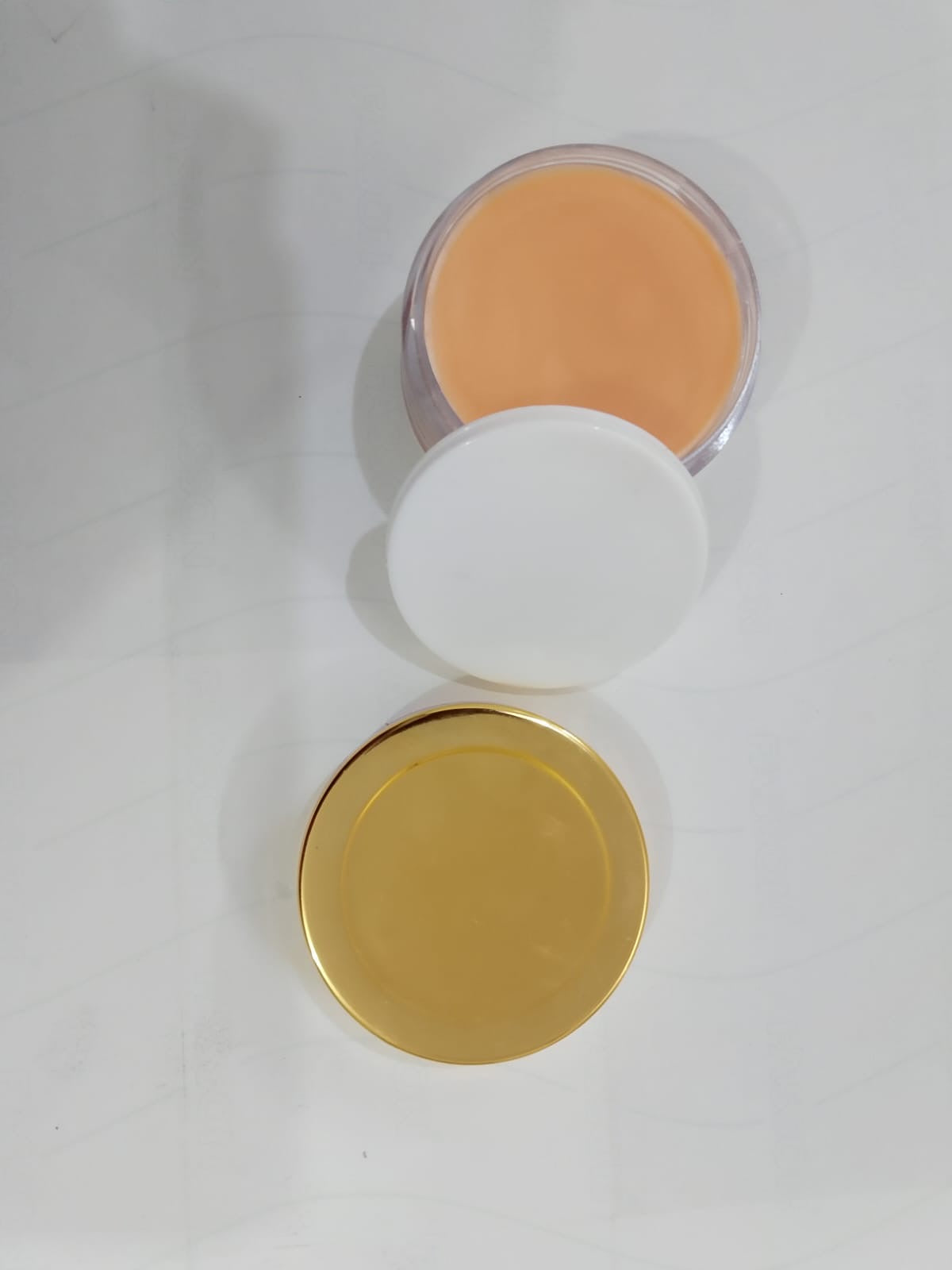 Pangi Hills UV Protection Seabuckthorn Cream open jar showing orange cream